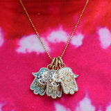 Buddha Mama: Small Sky Blue Hamsa Pendant